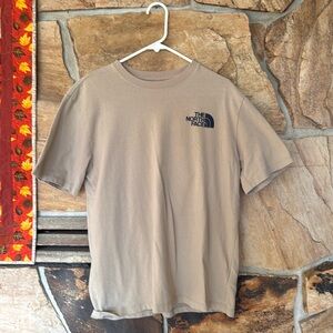 North Face ski t-shirt. Tan size medium